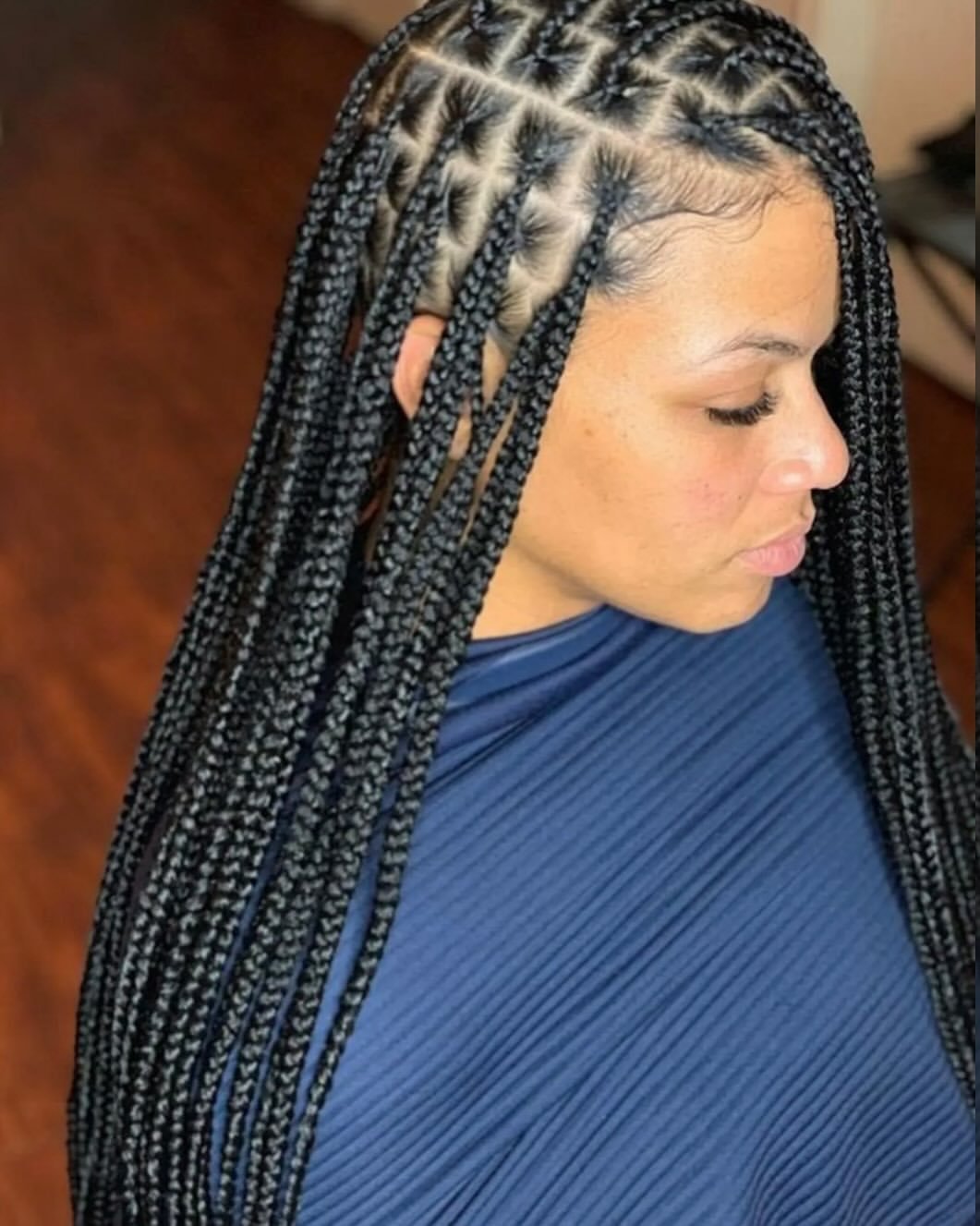 Long knotless box braids by MANGUE Hair Braiding